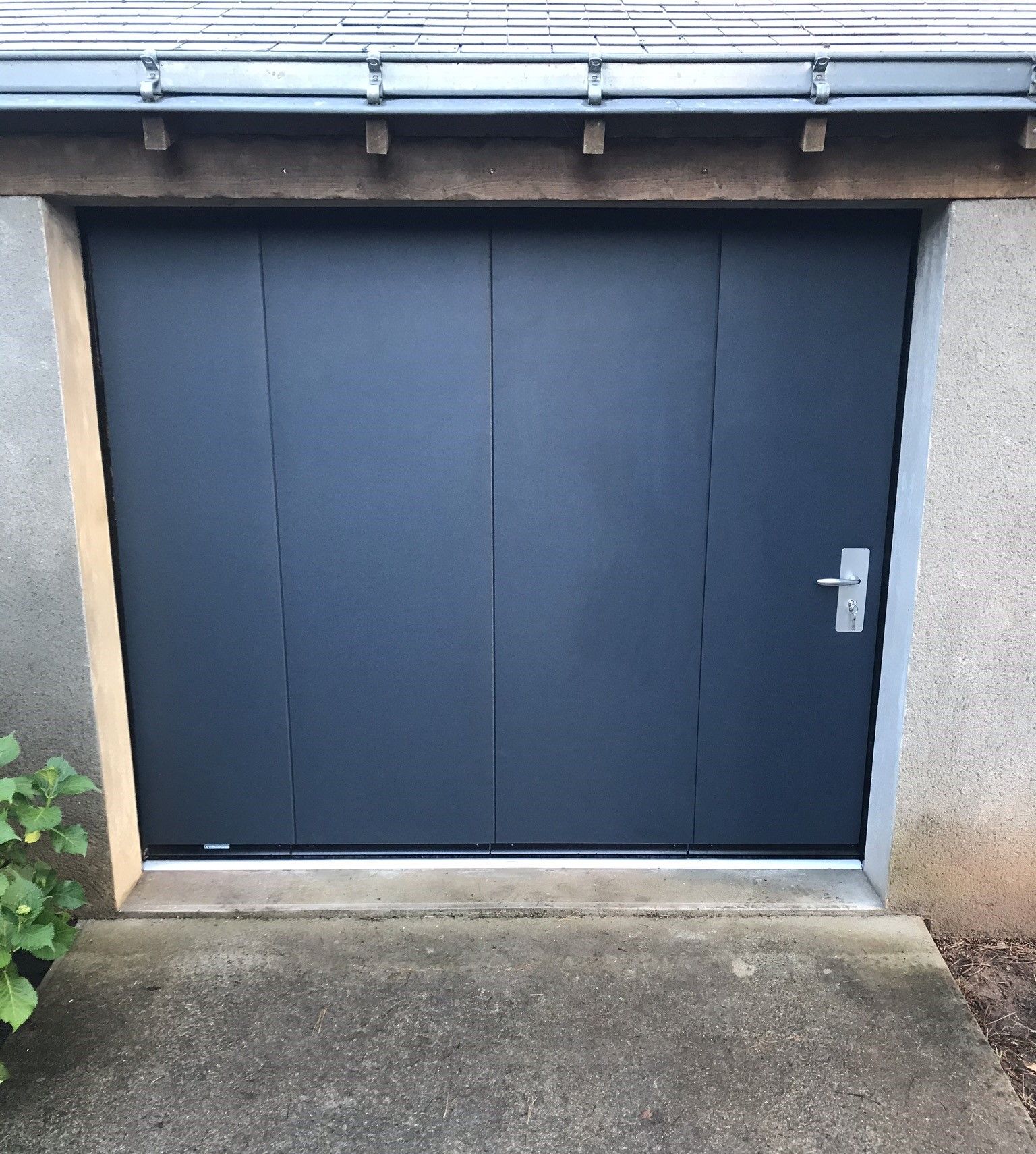 porte de garage sectionnelle latérale en acier isolée 40 mm