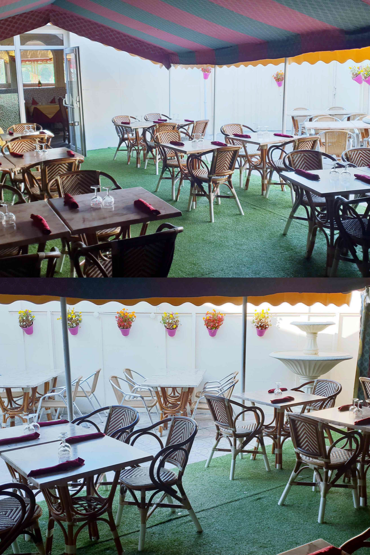 Espace repas extérieur avec tables et chaises sous une tente à rayures, sur une pelouse artificielle verte.