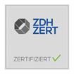 Ein zdh zert-Logo mit einem Häkchen darauf.