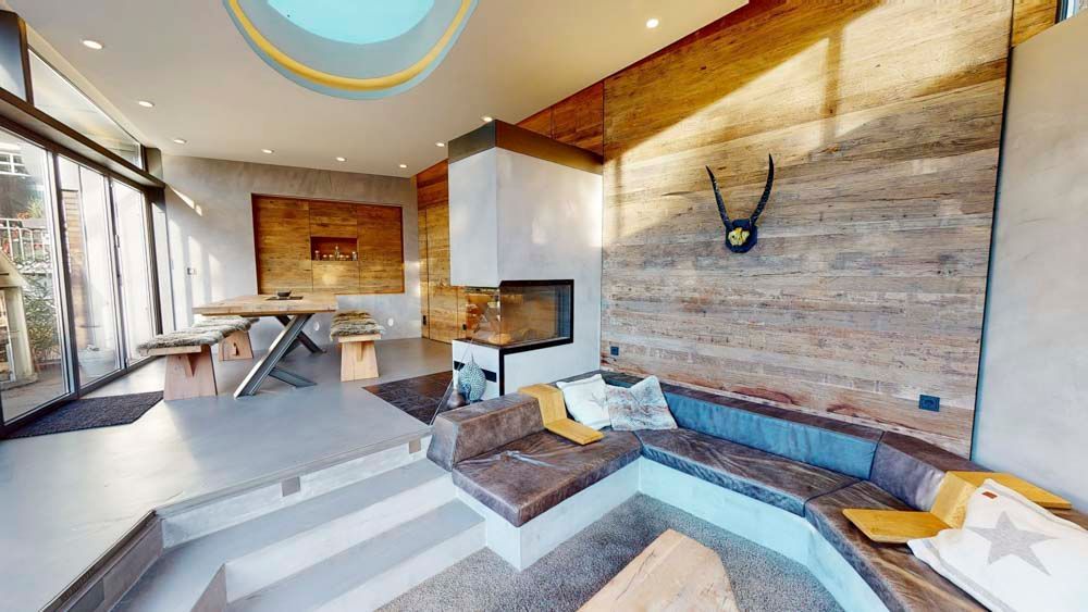 Objektdesign Hendlmeier Wohnraum | Zimmer mit Essplatz, Kamin und Couch