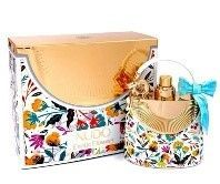 Set de regalo que incluye un bolso con estampado floral y detalles dorados, y una caja con el mismo diseño.