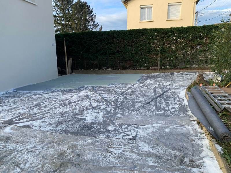 Pose d'une couverture pour empecher les infiltrations d'eau