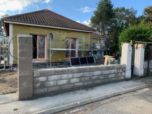 Construction d'un muret pour y installer une clôture