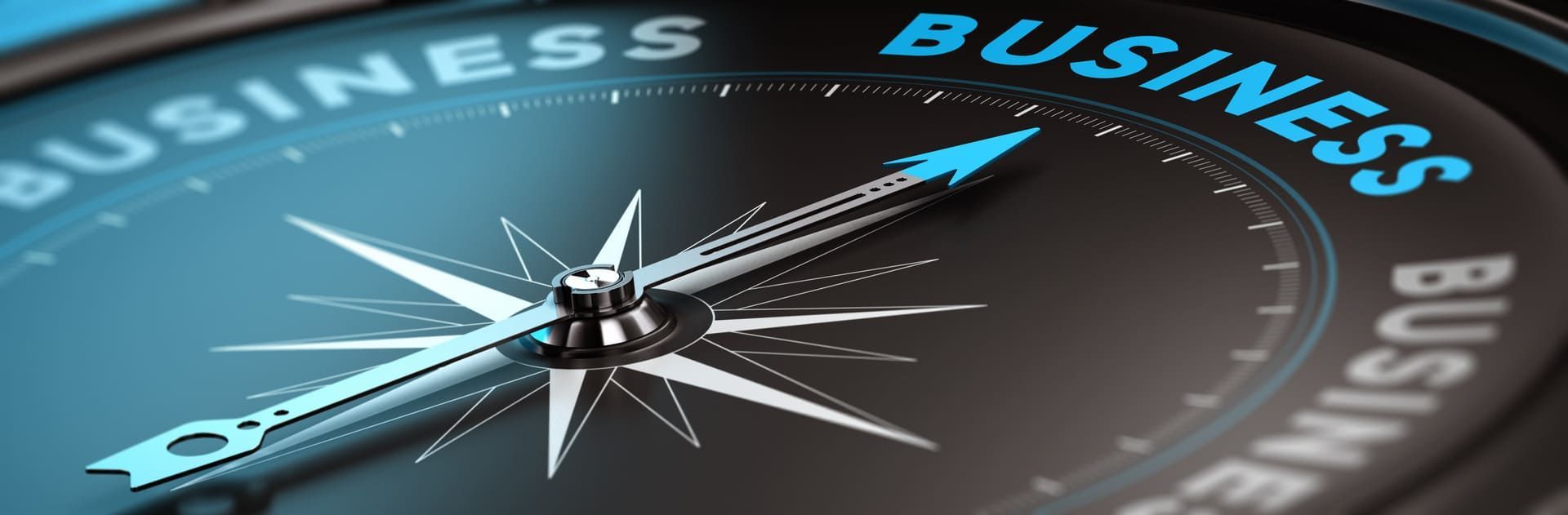 Eine Nahaufnahme eines Kompasses, der auf das Wort „Geschäft“ zeigt | Beate Hackmann Unternehmensberatung