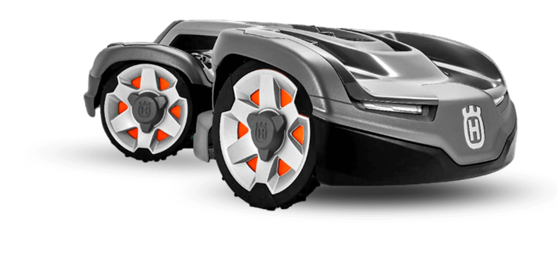 Una cortadora de césped está colocada sobre una superficie blanca.