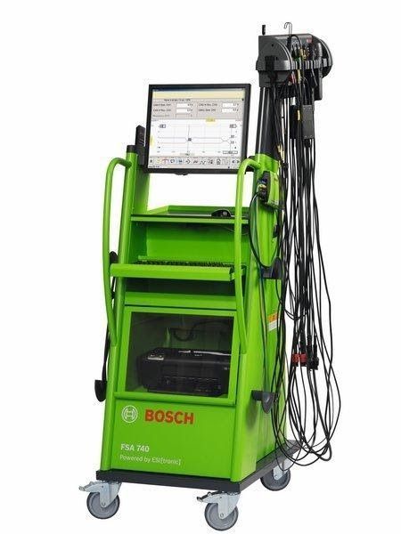 Un carrito Bosch verde con una computadora encima.