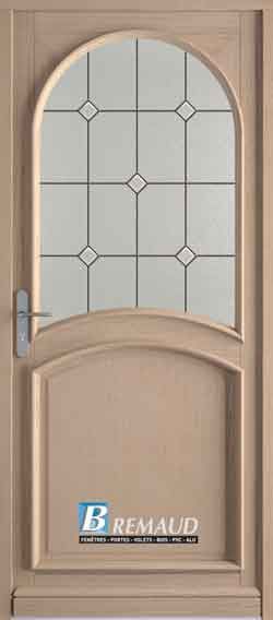 Porte en bois beige avec panneau de verre cintré, décor en verre plombé et logo Remaud.