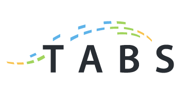 Logotipo de TABS en gris oscuro con arcos punteados azules, verdes y amarillos sobre las letras.