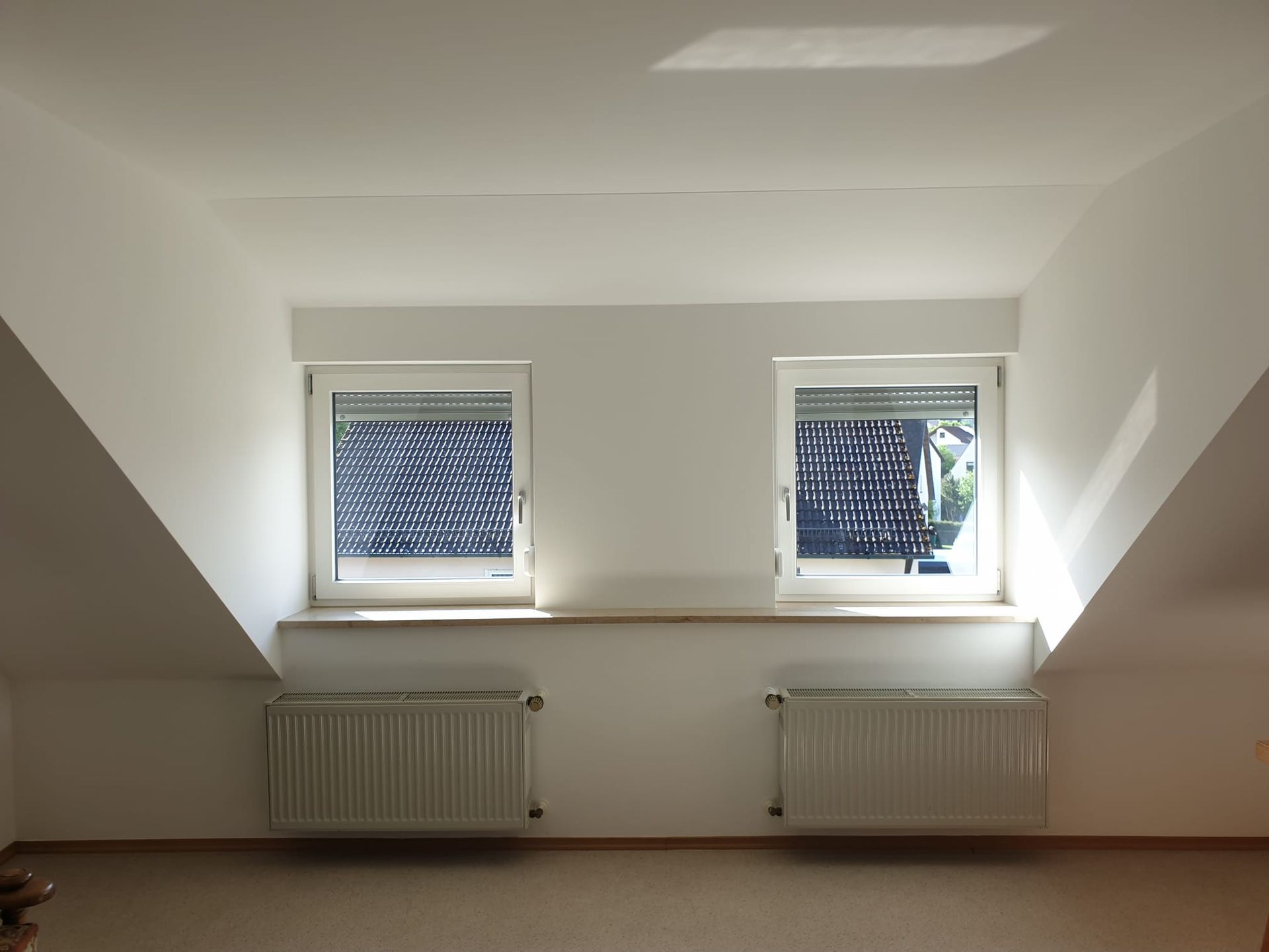 Nachher: Energetische Sanierung inkl. Einbau neuer Wohnraumdachfenster