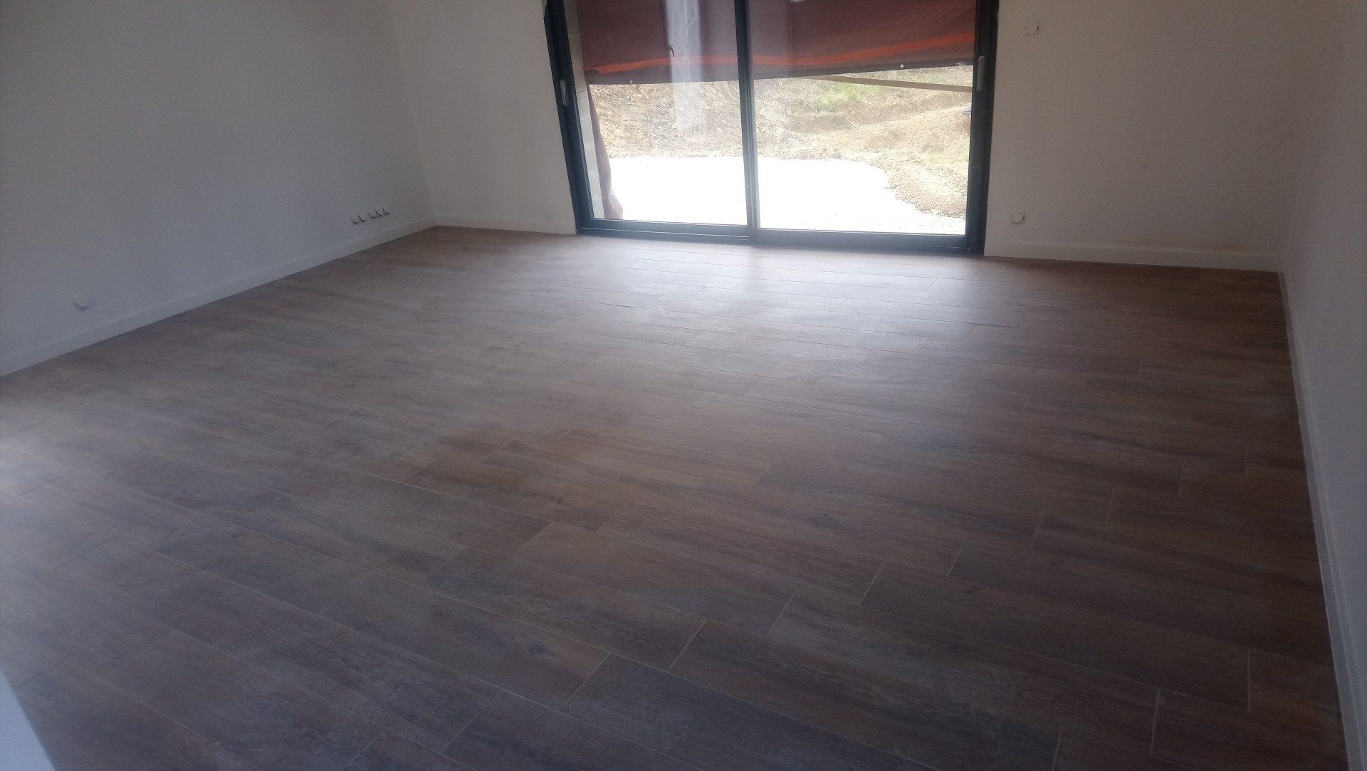 Pose d'un carrelage sur mesure