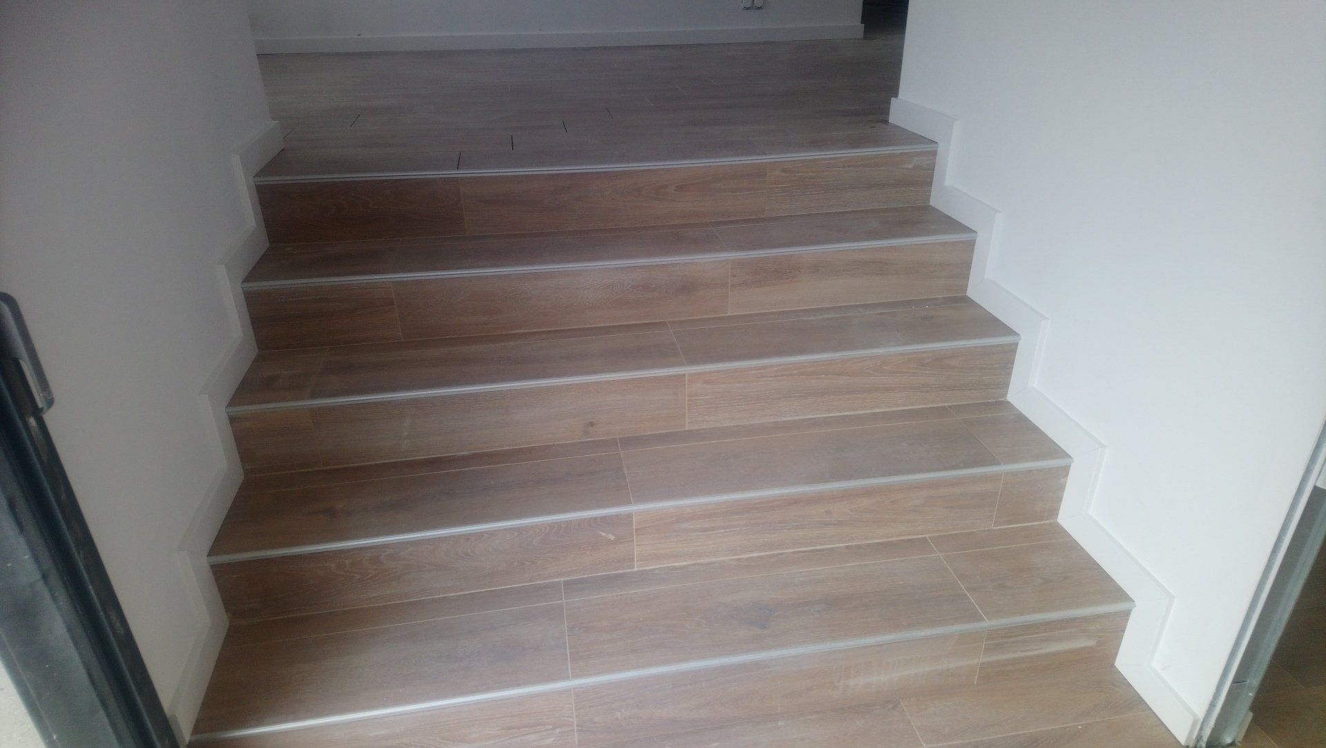 Pose de carrelage pour un escalier