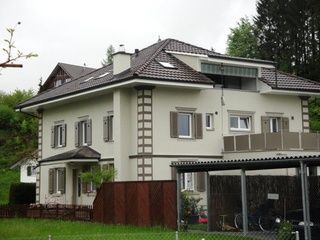Fassadenrenovation Mehrfamilienhaus Schötz 2013