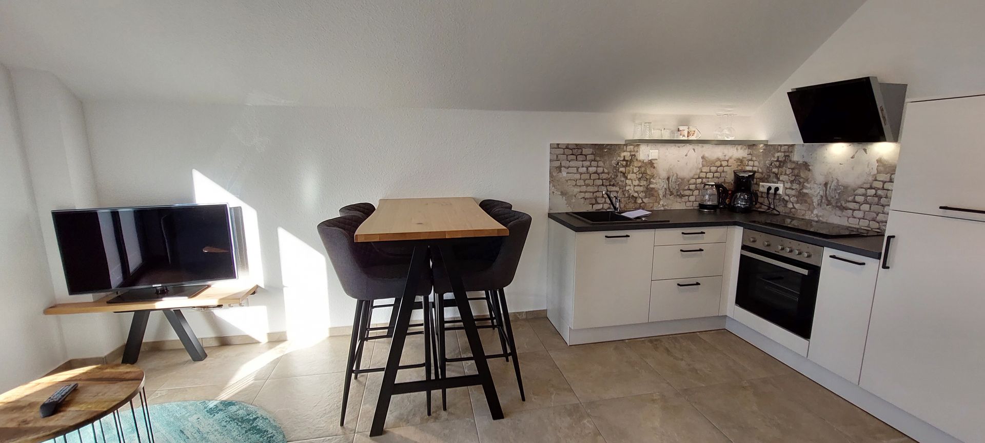 Ferienwohnung mit Küche und Essbereich