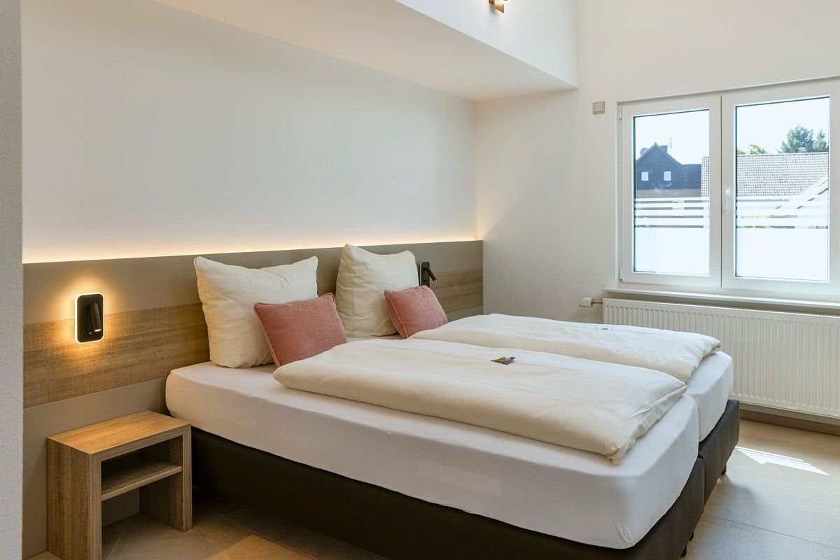 Hotelzimmer mit Doppelbett