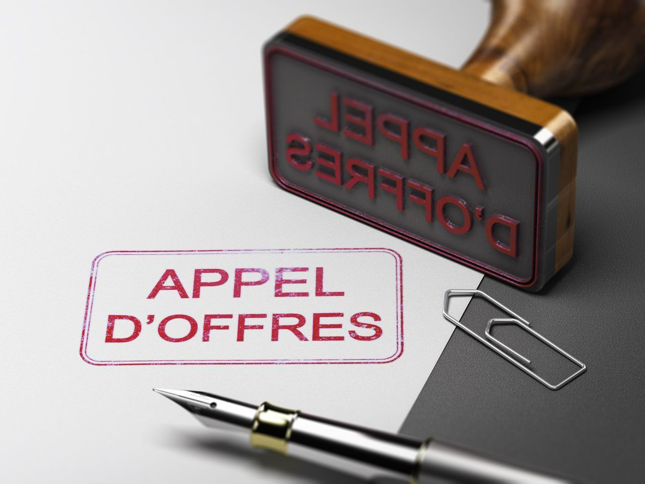 Un tampon mentionnant un appel d'offres