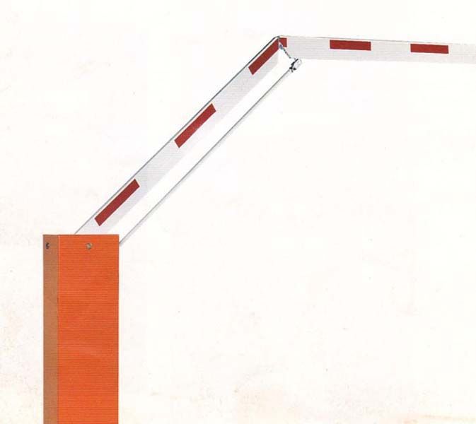 Una barrera naranja y blanca con rayas rojas.