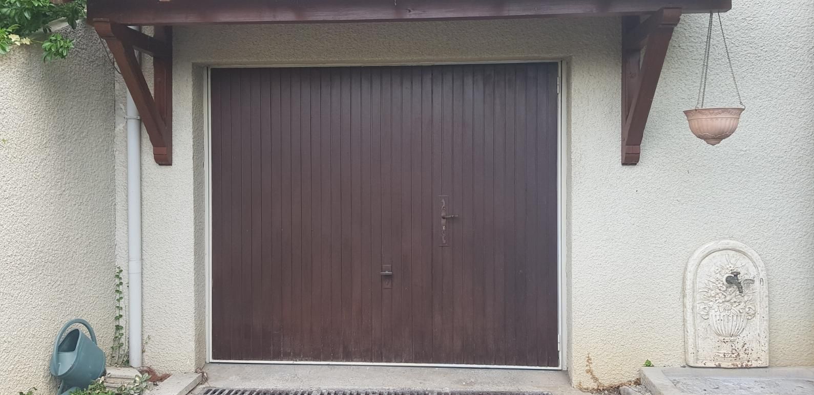 Porte de garage sectionnelle en bois