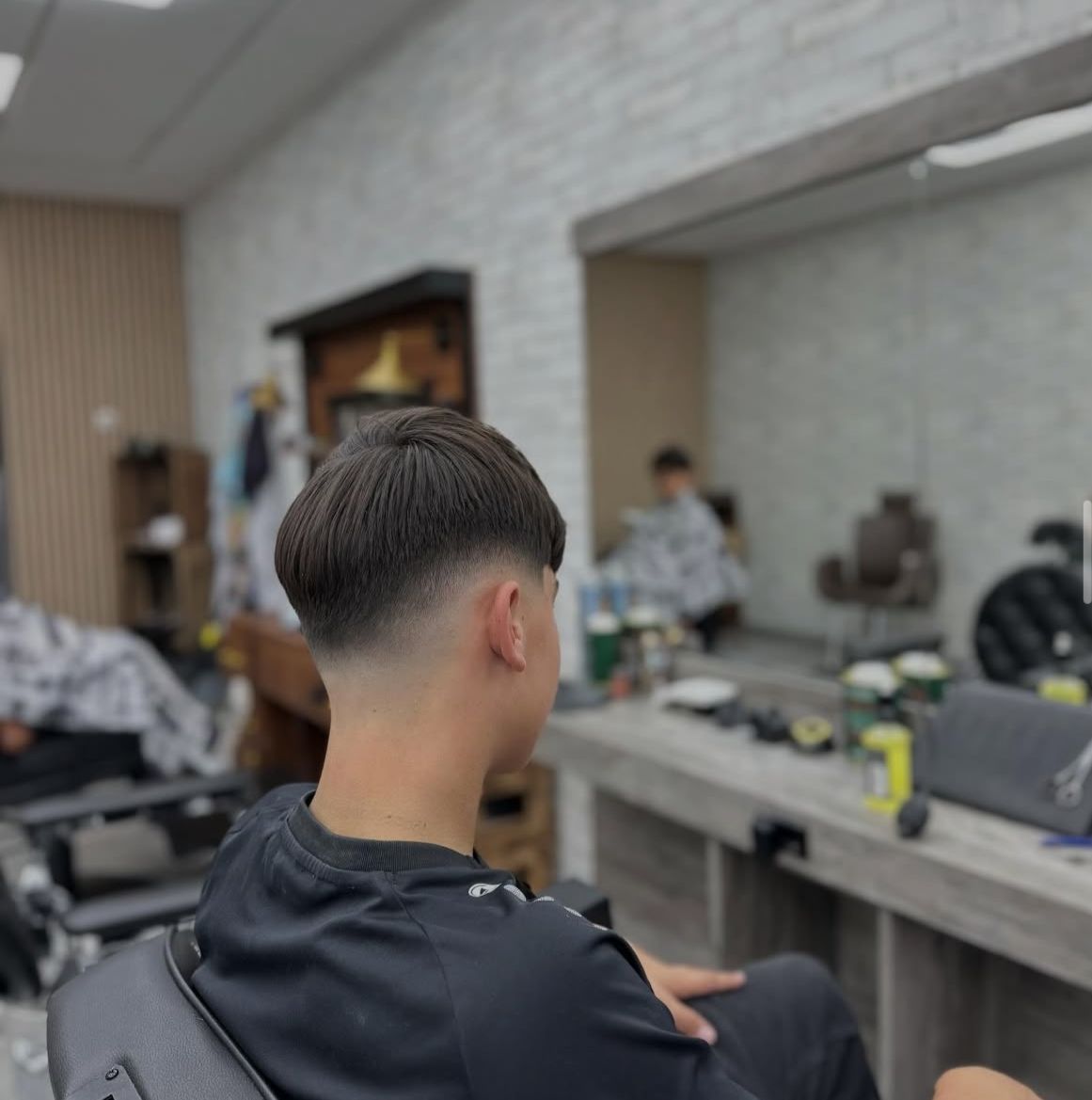 Herrenhaarschnitt faded kleiner Junge