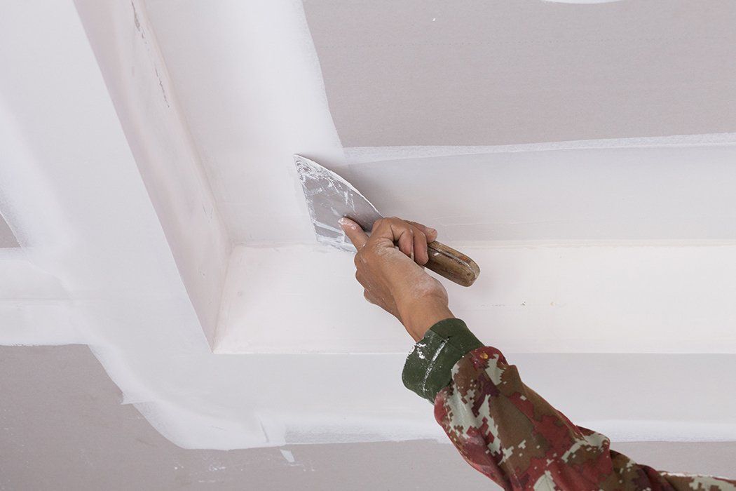 Truelle avec plâtre