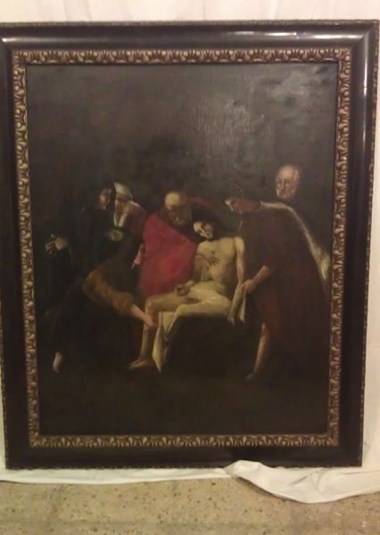 Un cuadro antiguo, con unas personas ayudando alguien enfermo