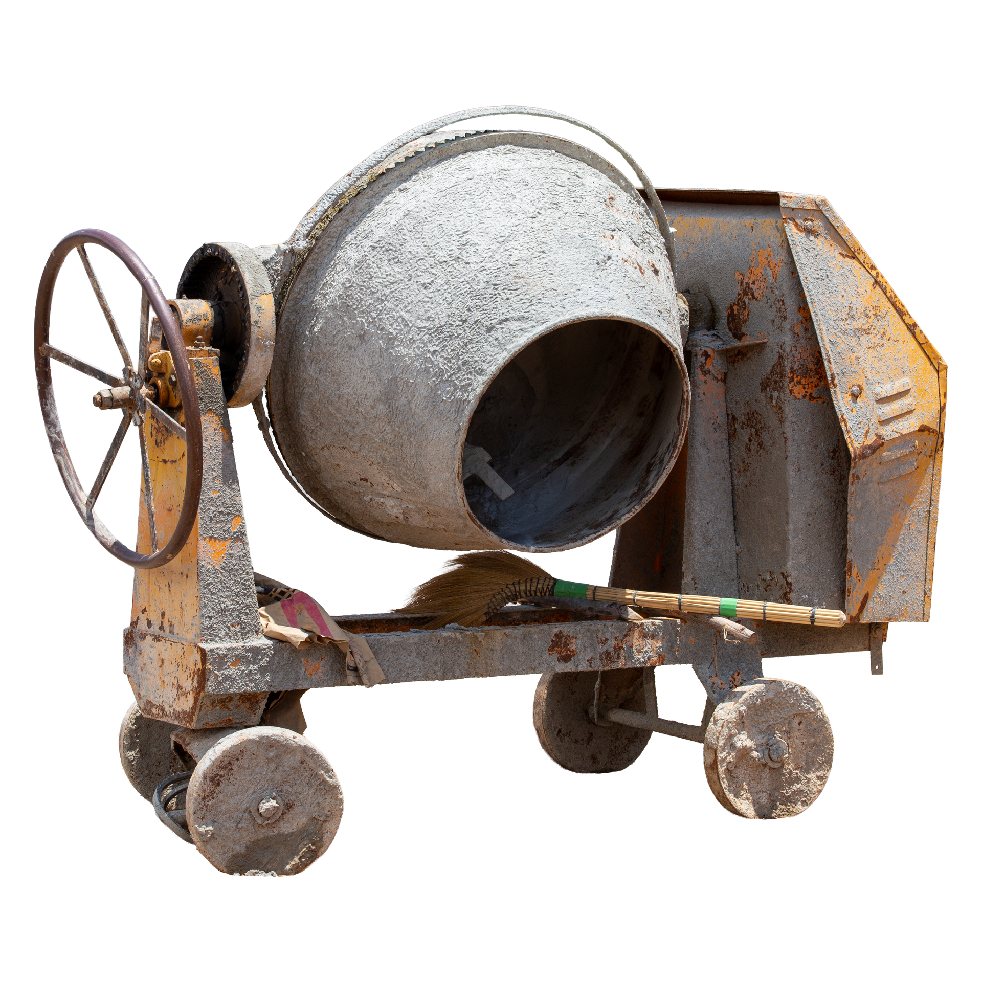 Bétonnière rouillée sur roues, utilisée pour la construction.