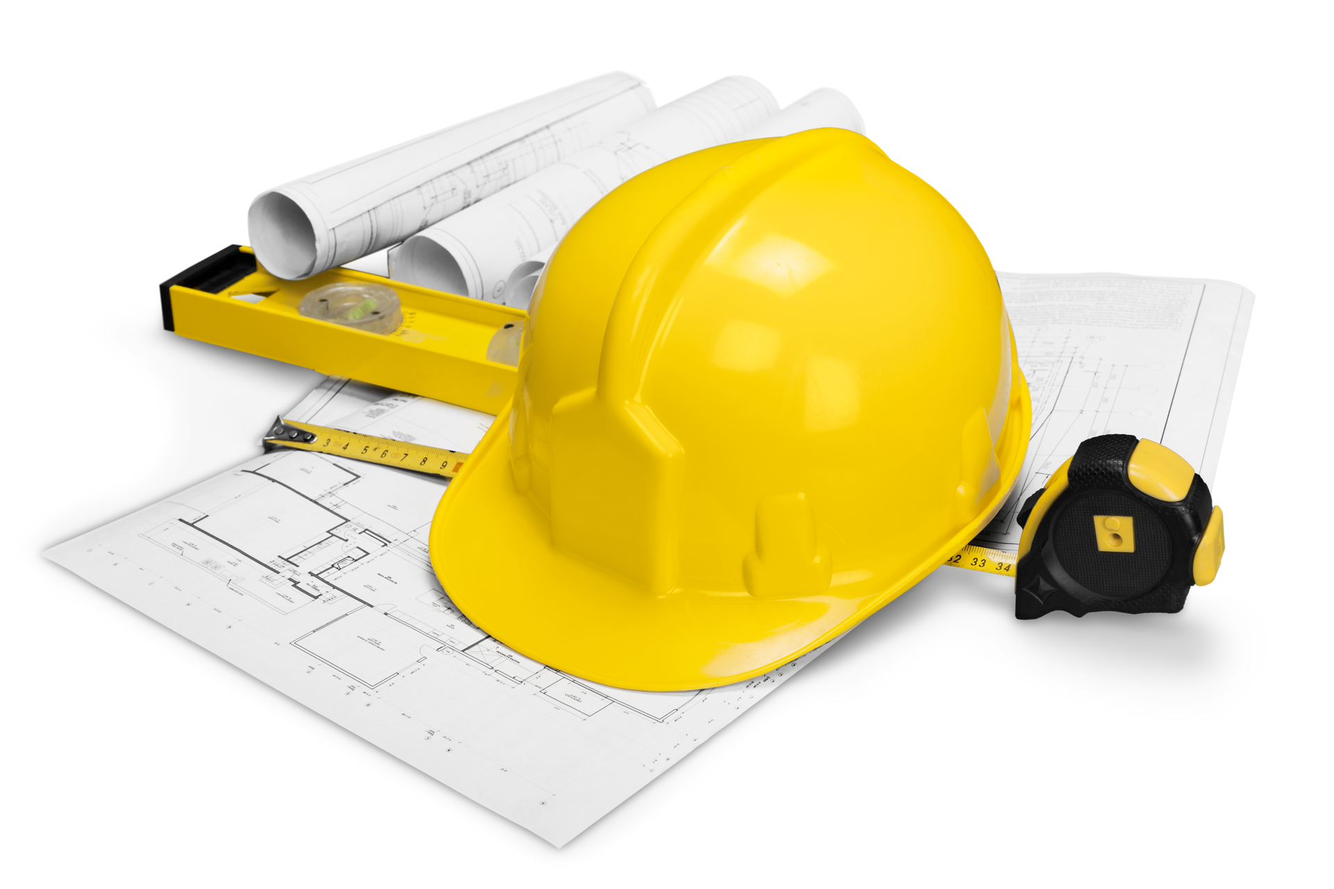 Casque de sécurité jaune sur plans avec outils.