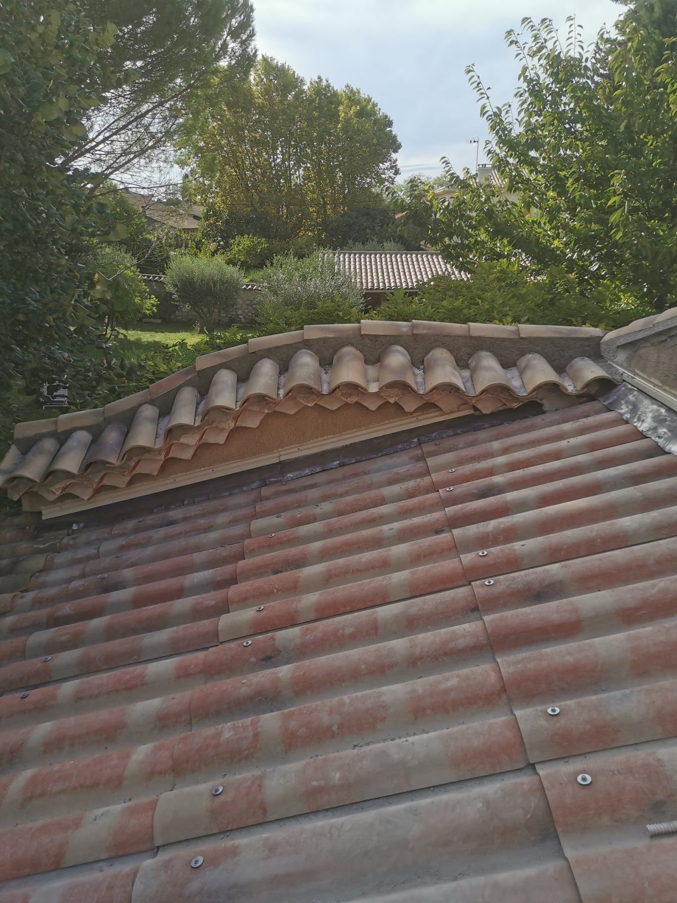 Rehaussement de toit habillé en tuiles