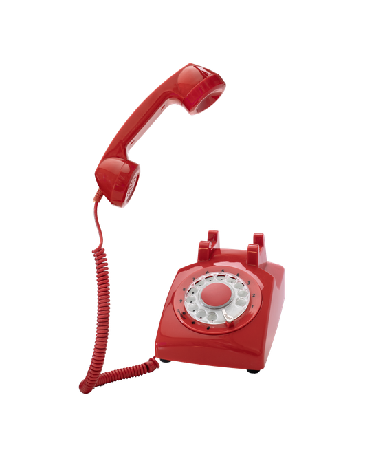 Téléphone à cadran rouge avec combiné détaché de la base, relié par un cordon en spirale.