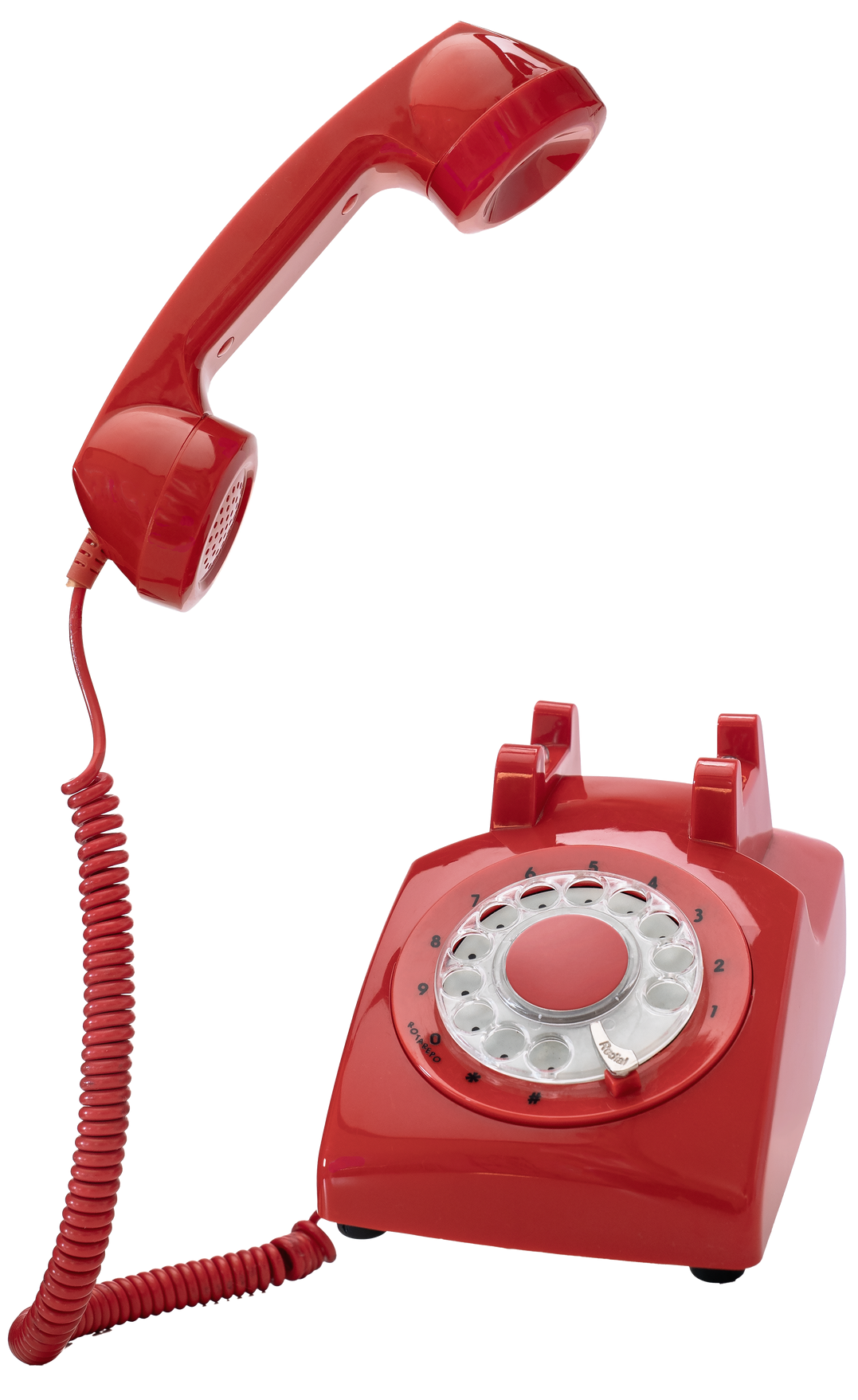 Téléphone à cadran rouge avec combiné détaché de son socle et cordon enroulé