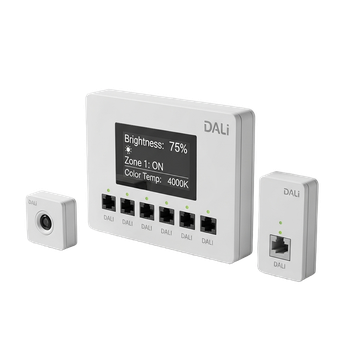 White electrical outlet with two sockets and switches on a neutral wall.