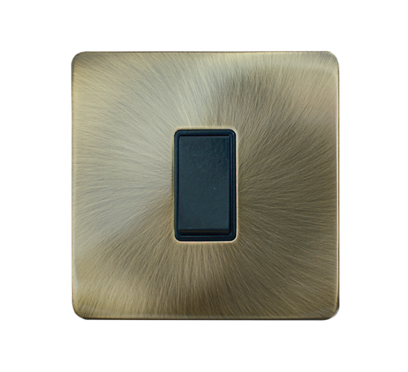 Silver light switch mounted on a gray wall.