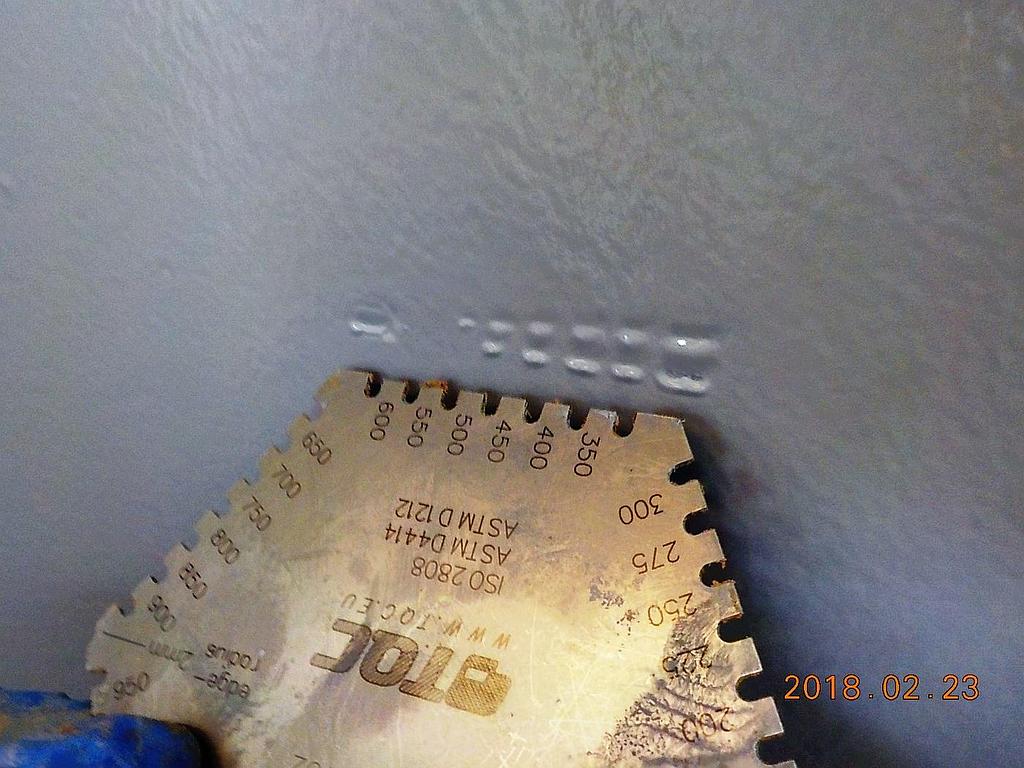 Contrôle d'épaisseur sur film humide