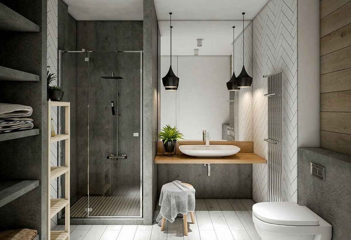 Salle de bains moderne et minimaliste avec douche en verre, meuble-lavabo en bois, miroir rond et toilettes