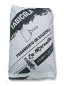 Una bolsa de tabicola con una espátula encima