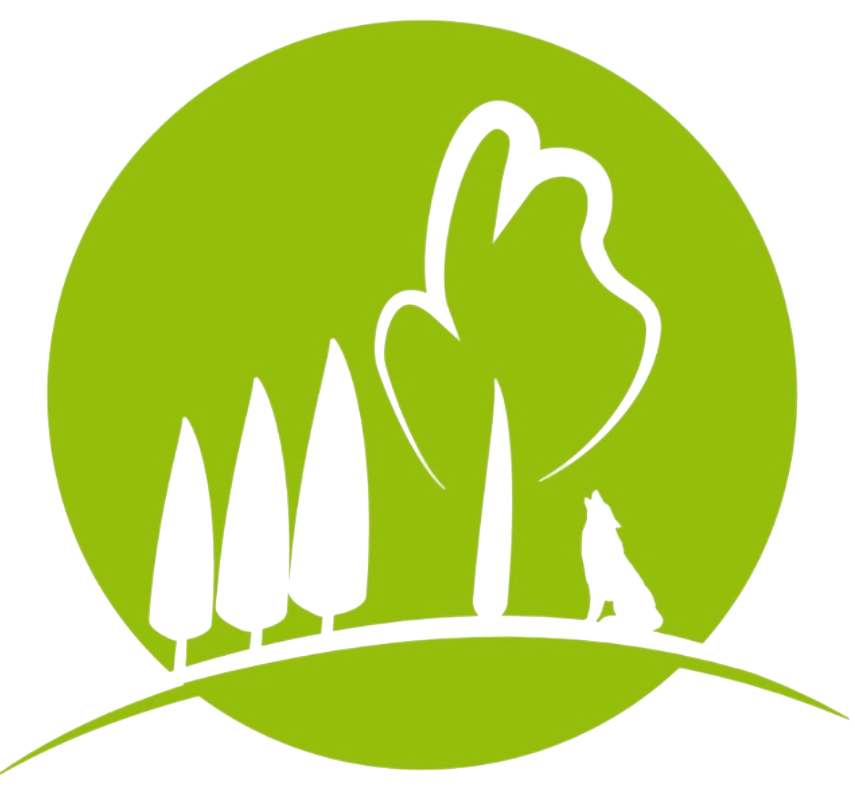 ein grüner Kreis mit Bäumen und einem Wolf darin