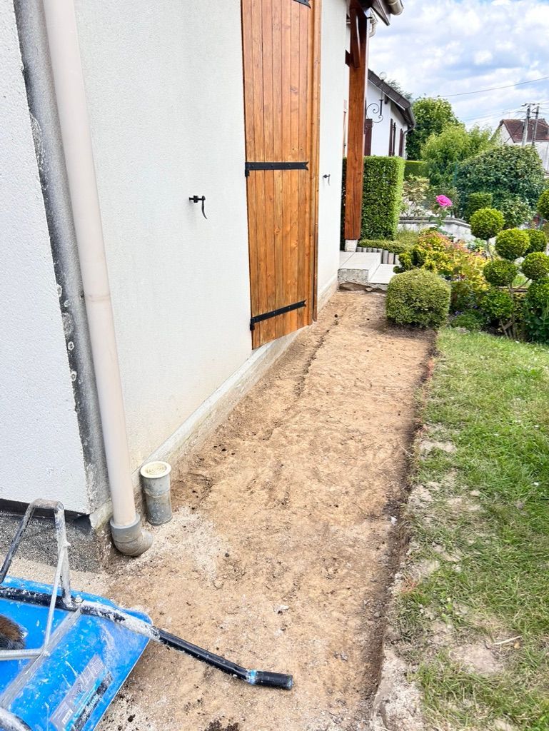 Aménagement d'un passage pour piéton le long d'une maison