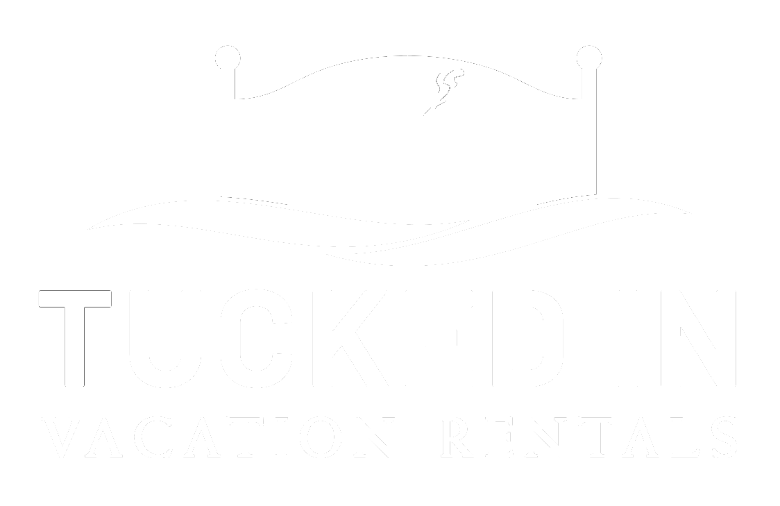 Logo for "Tucked In Vacation Rentals": cabin silhouette in a bed frame, with the text "Tucked In Vacation Rentals".