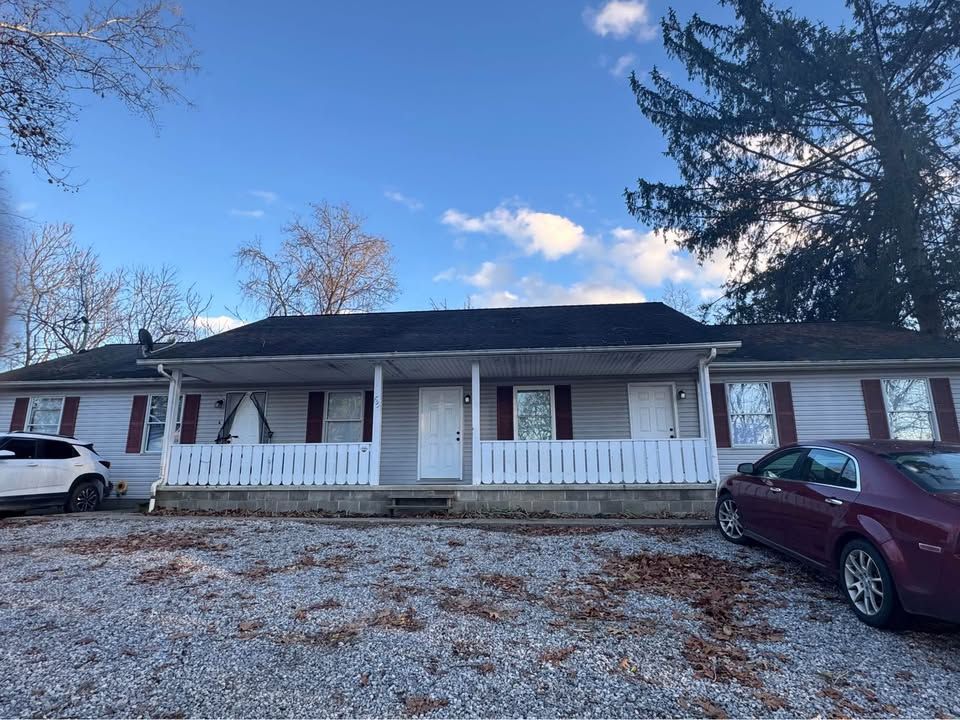 Long term rental home Triplex exterior with covered porch