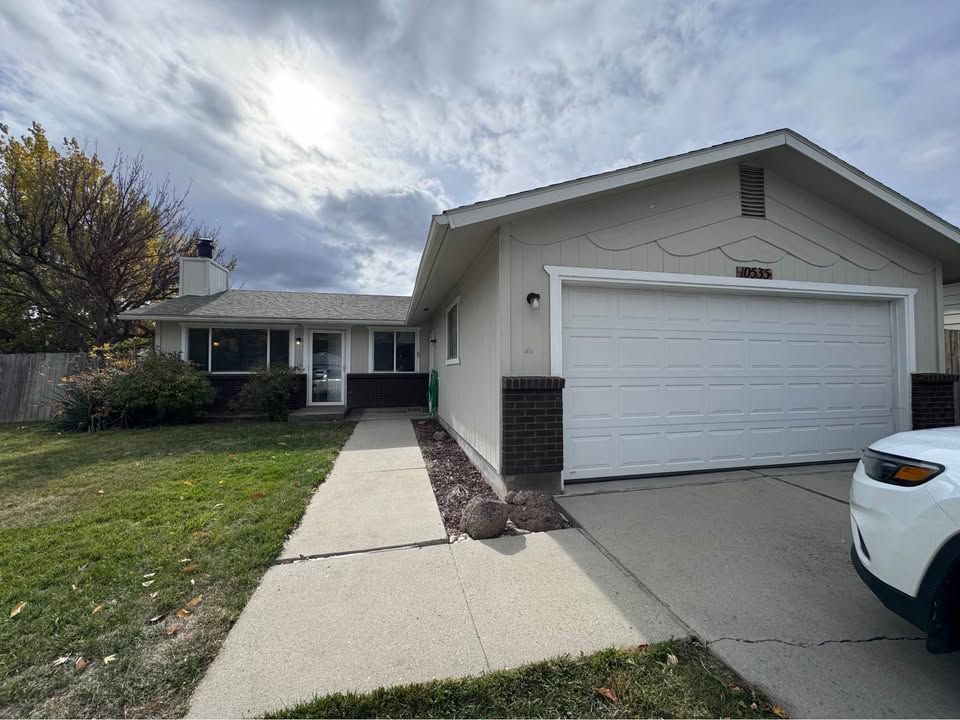 Long term rental home exterior garage and entry