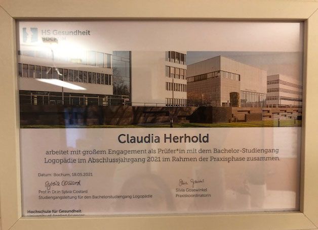 Ein gerahmtes Zertifikat mit der Aufschrift „Claudia Herhold“