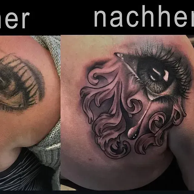 Cover up Tattoo an der Schulter: altes Motiv umgestaltet zu einem ornamentalen Design mit stilisiertem Auge