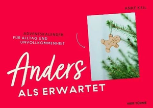 Ein rotes Poster mit dem Bild eines Lebkuchenmanns, der an einem Weihnachtsbaum hängt.