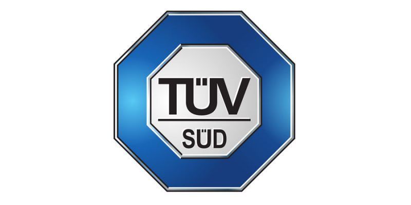 Ein blaues Schild mit der Aufschrift TÜV Süd