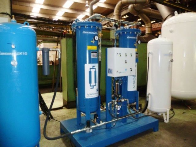 Un tanque azul con la letra o en él