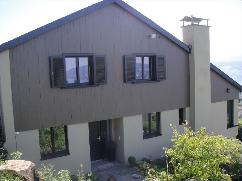 Bemalte Hausfassade, Arbeit der Malerei Lampert