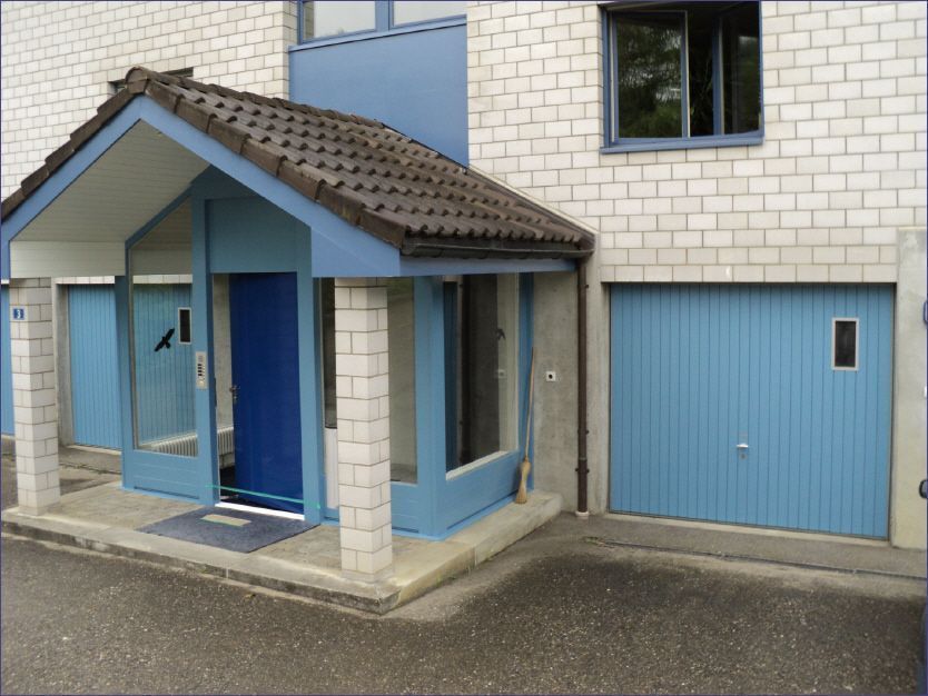 Bemalte Hausfassade, Arbeit der Malerei Lampert