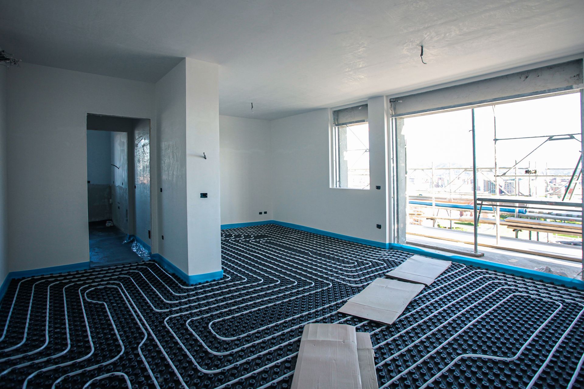 Chambre en construction avec plancher chauffant.