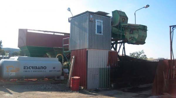 Un recipiente con la palabra escomano.