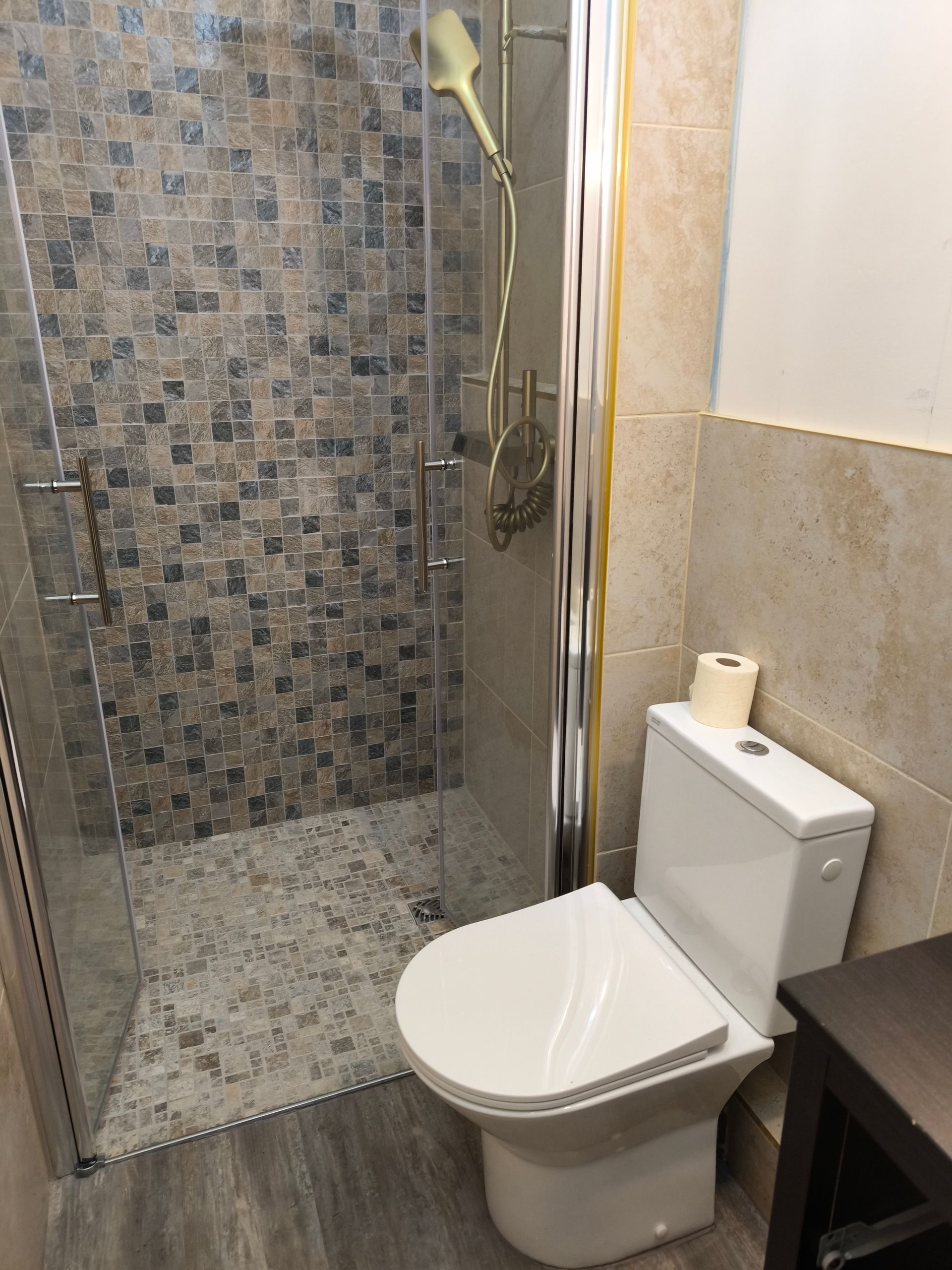 Douche avec portes battantes vitrées