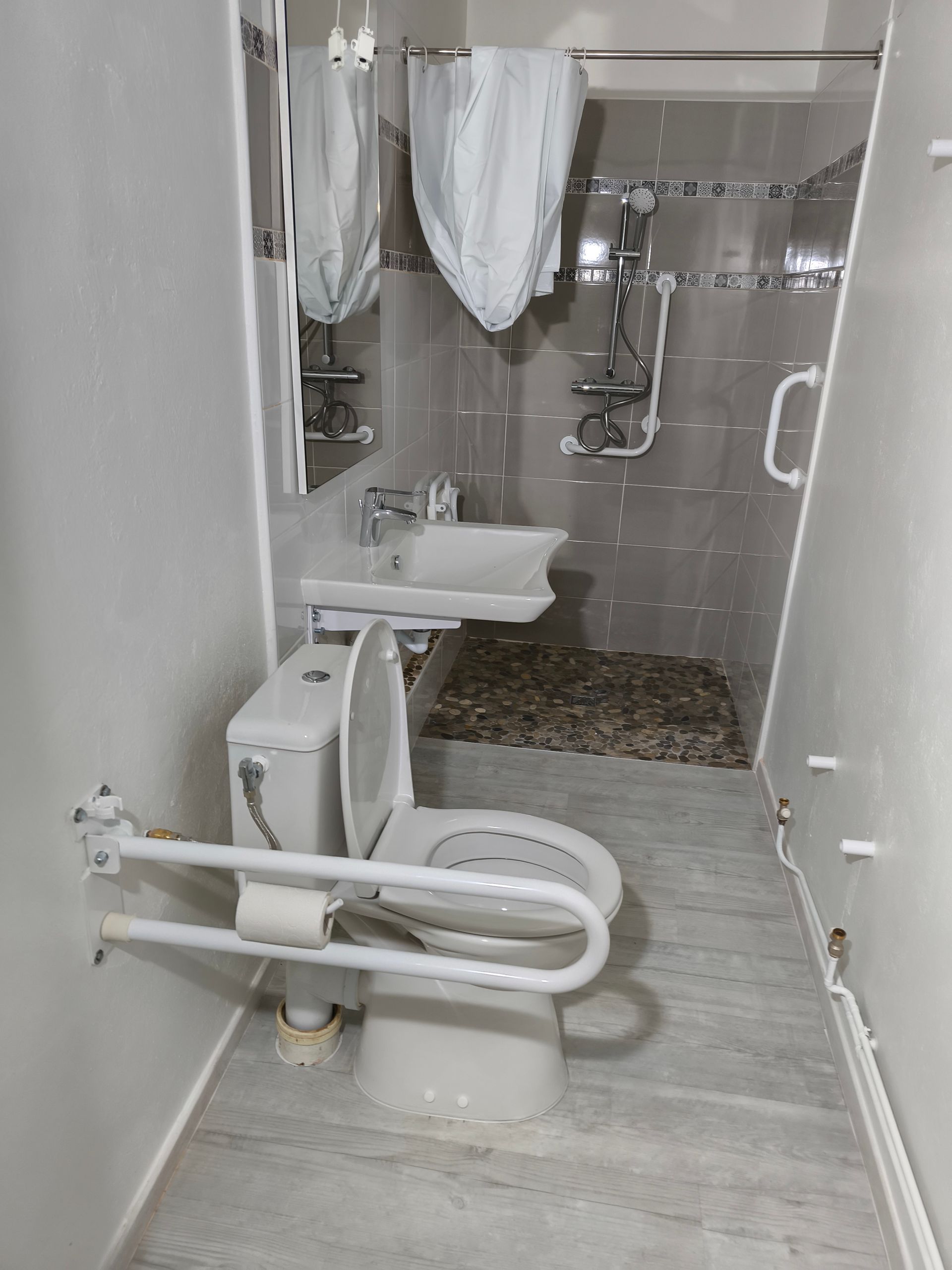 Adaptation d'une salle de bain Personne à mobilité réduite